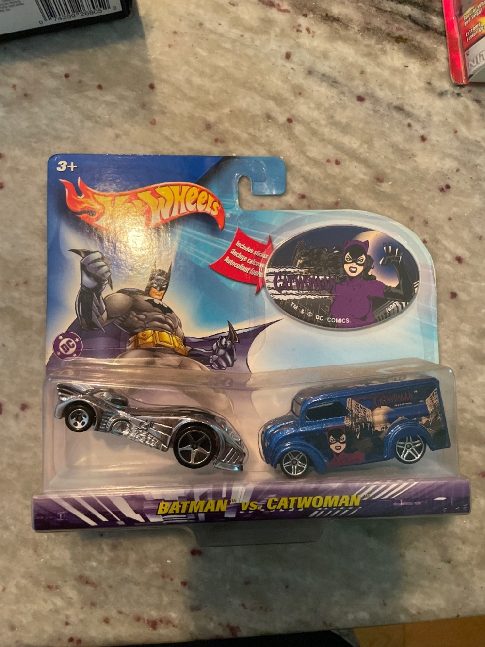 Hot wheels Batman versus Catwoman cars